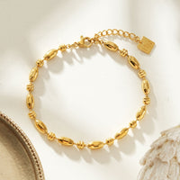 ADIATA Gold: Polished Oval Bead Bracelet – Sculpted Statement Jewellery