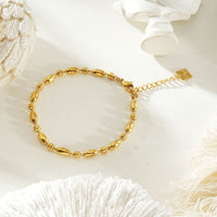 ADIATA Gold: Polished Oval Bead Bracelet – Sculpted Statement Jewellery