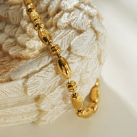 ADIATA Gold: Polished Oval Bead Bracelet – Sculpted Statement Jewellery