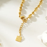 ADIATA Gold: Polished Oval Bead Bracelet – Sculpted Statement Jewellery