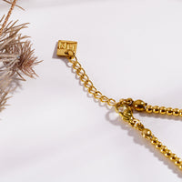 SUMAN: Pink Aventurine Stones and Gold Beaded Bracelet.